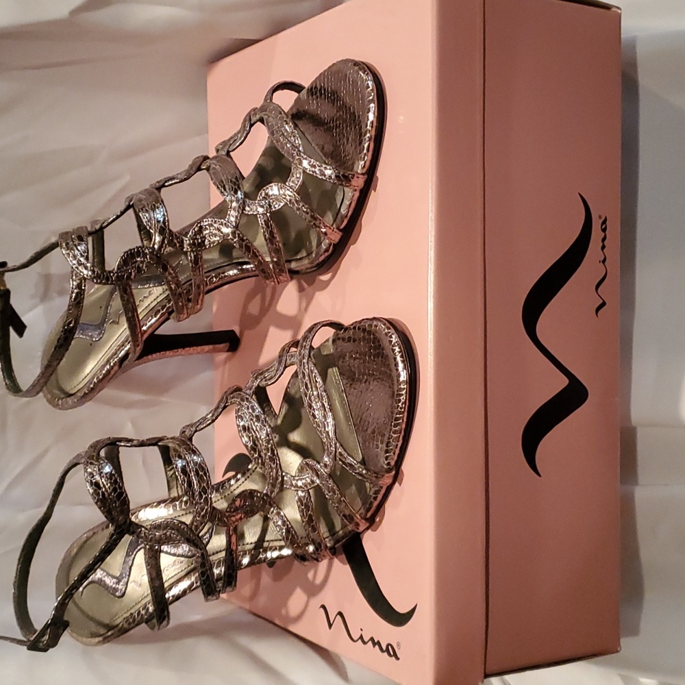 Strappy dress shoes. Made by Nina. Color is gunmetal.